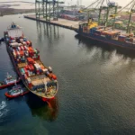 Foto udara kapal kargo dan crane di Pelabuhan Tanjung Priok Jakarta